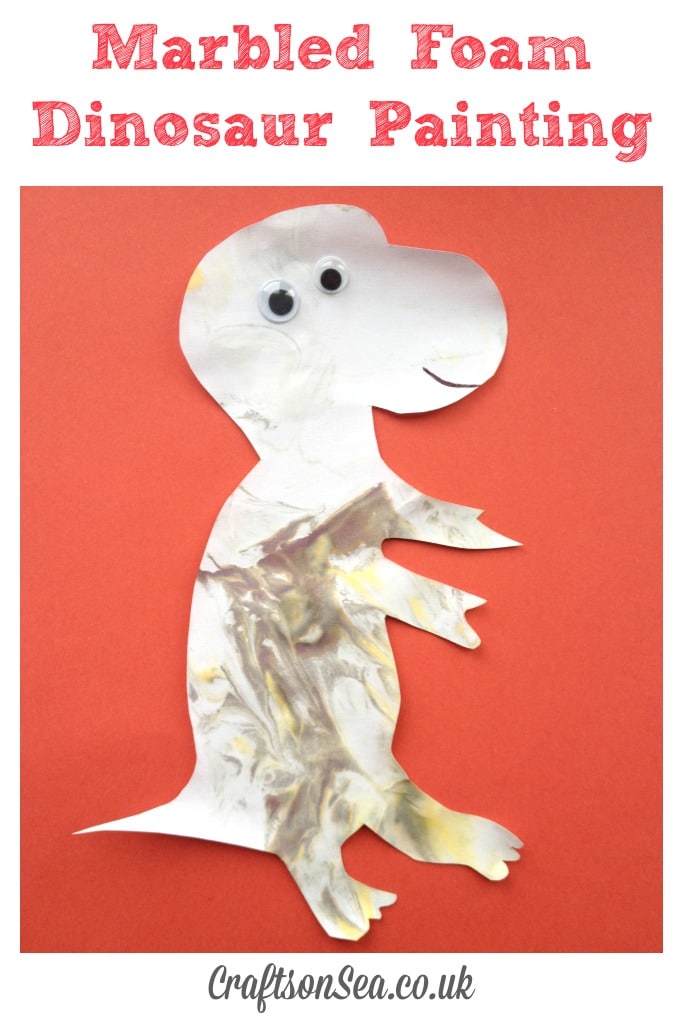 dinosaur messy play painting using marbled foam